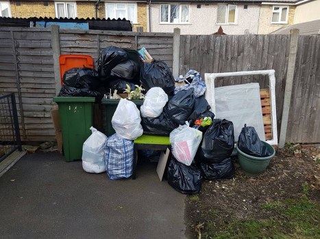 Professional garage clearance team in action