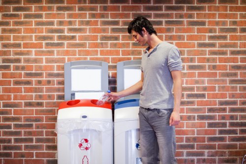 Service staff inspecting business waste containers after a reported issue